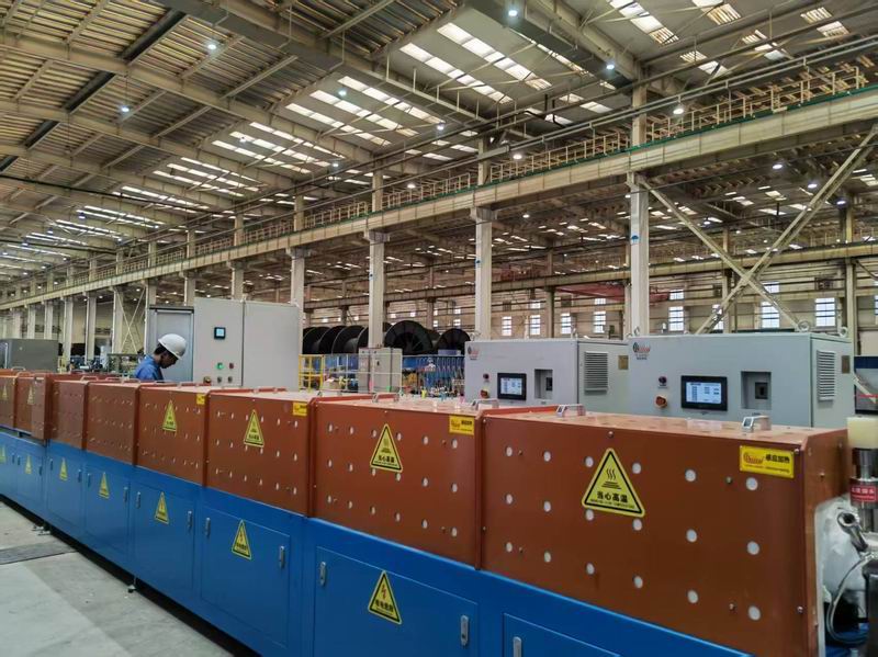 Continuous coiled tubing induction heating bright annealing production line